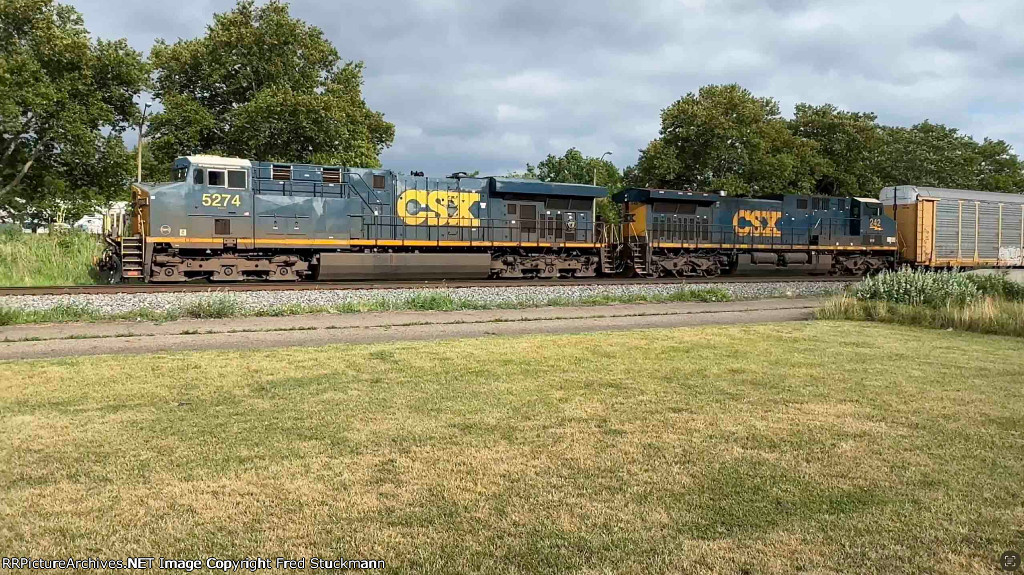 CSX 5274 steps fully into the sun light.